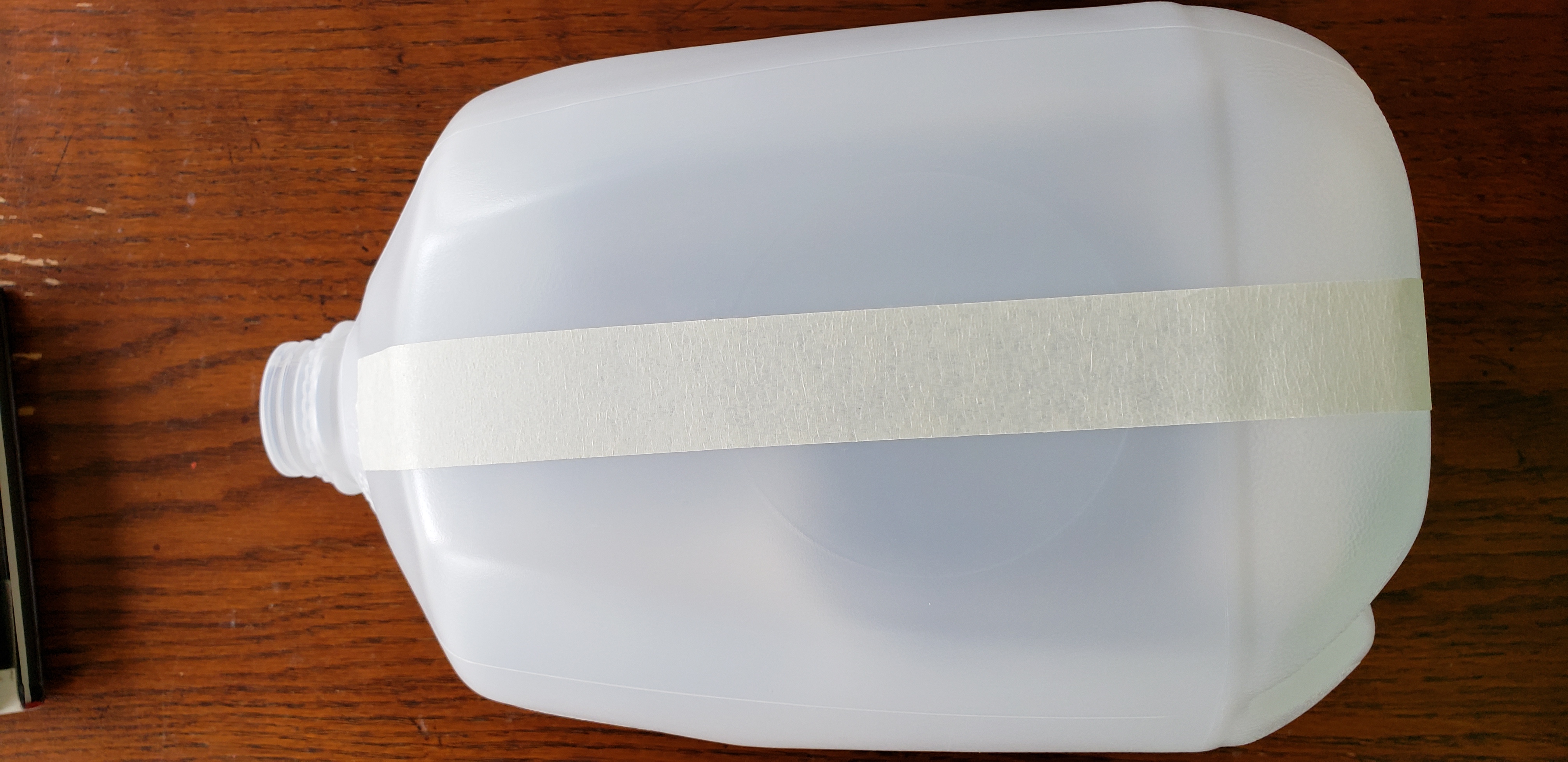 Tape on side of jug