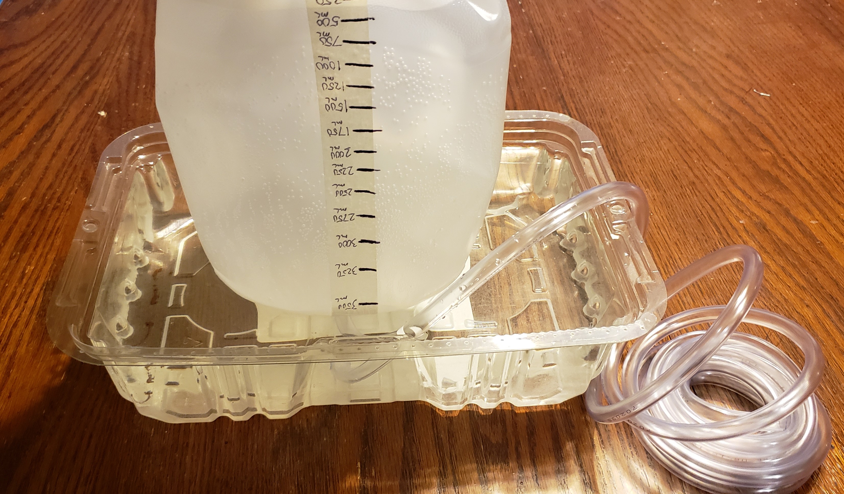 Jug in water with tubing
